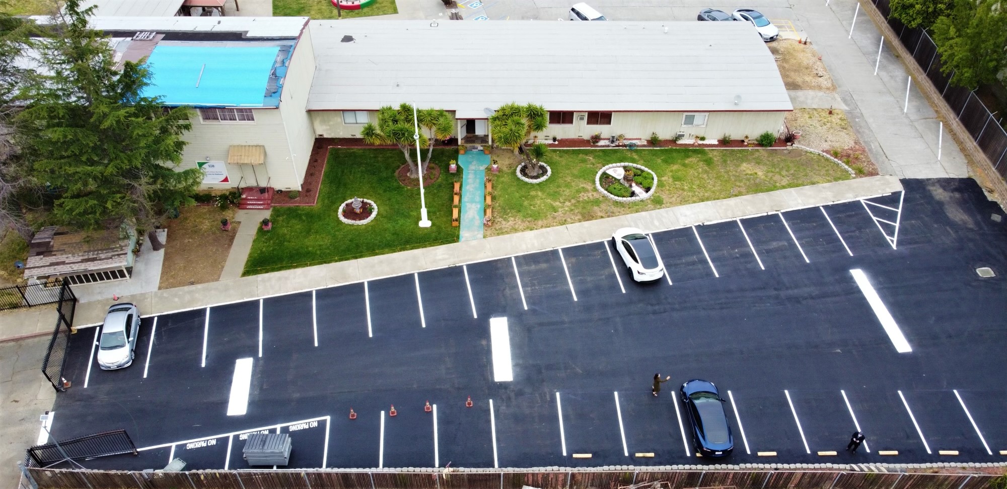 Overhead view of a freshly paved Vacaville parking lot